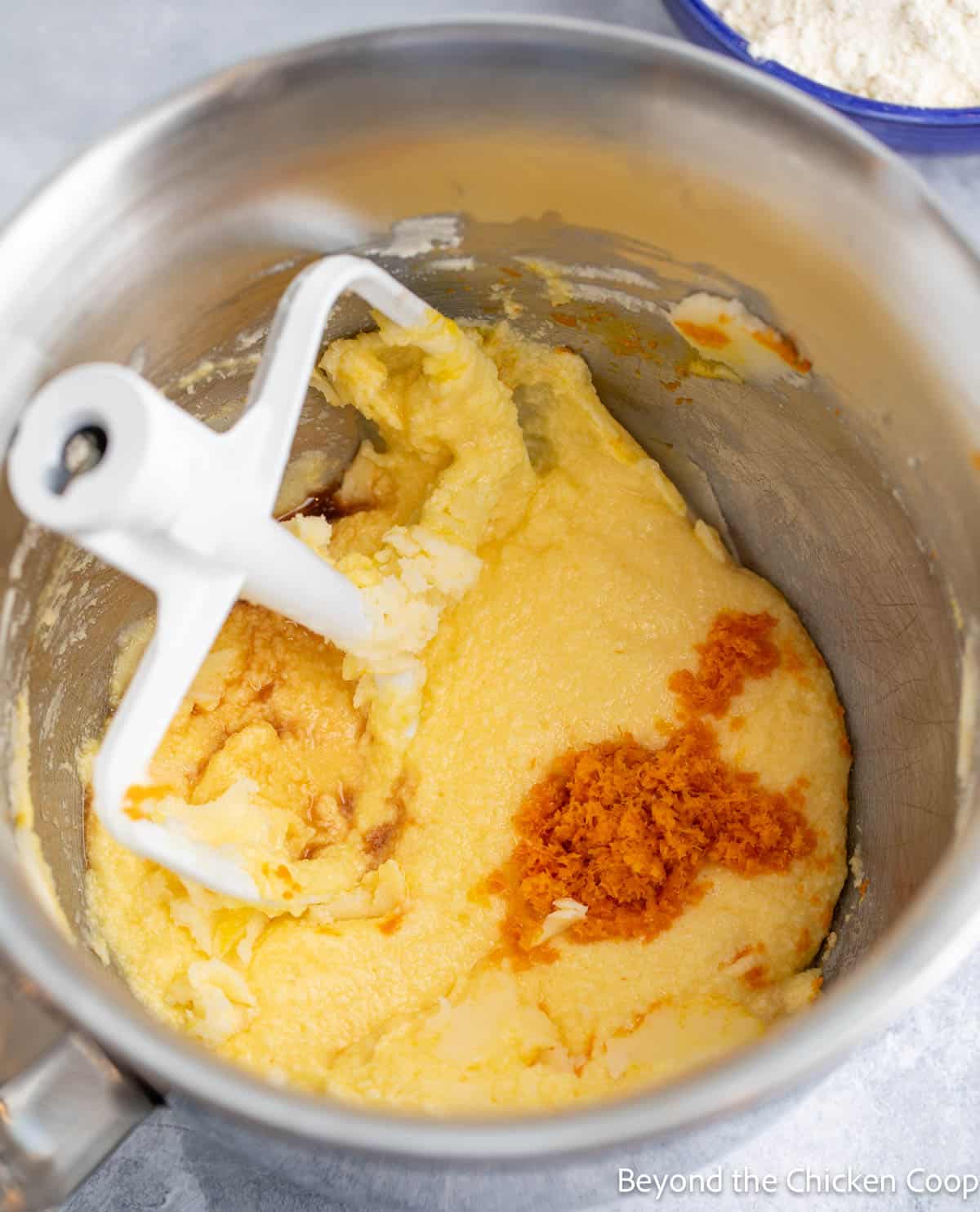 Orange zest added to cake batter. 