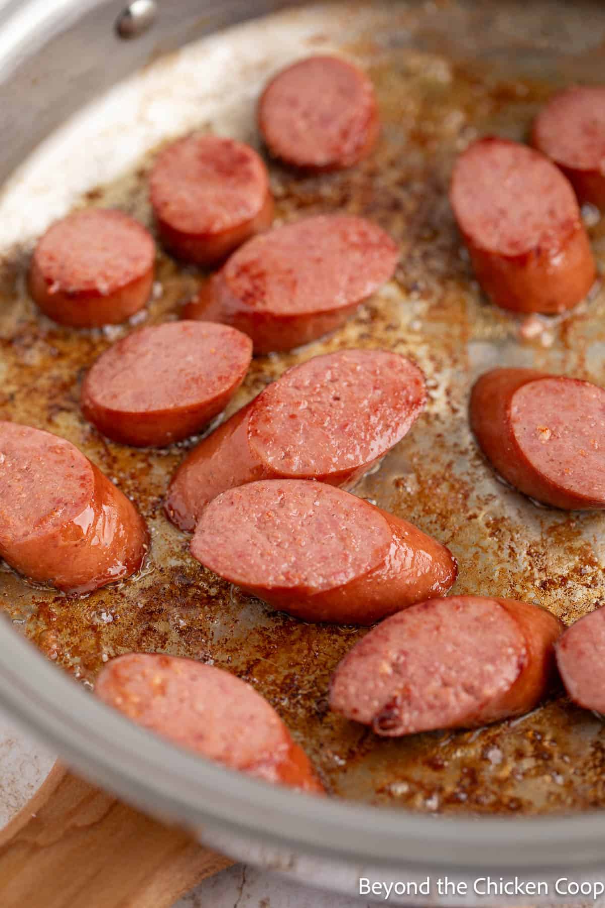 Kielbasa sausage in a skillet. 