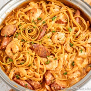 A pan filled with Shrimp Sausage Pasta.