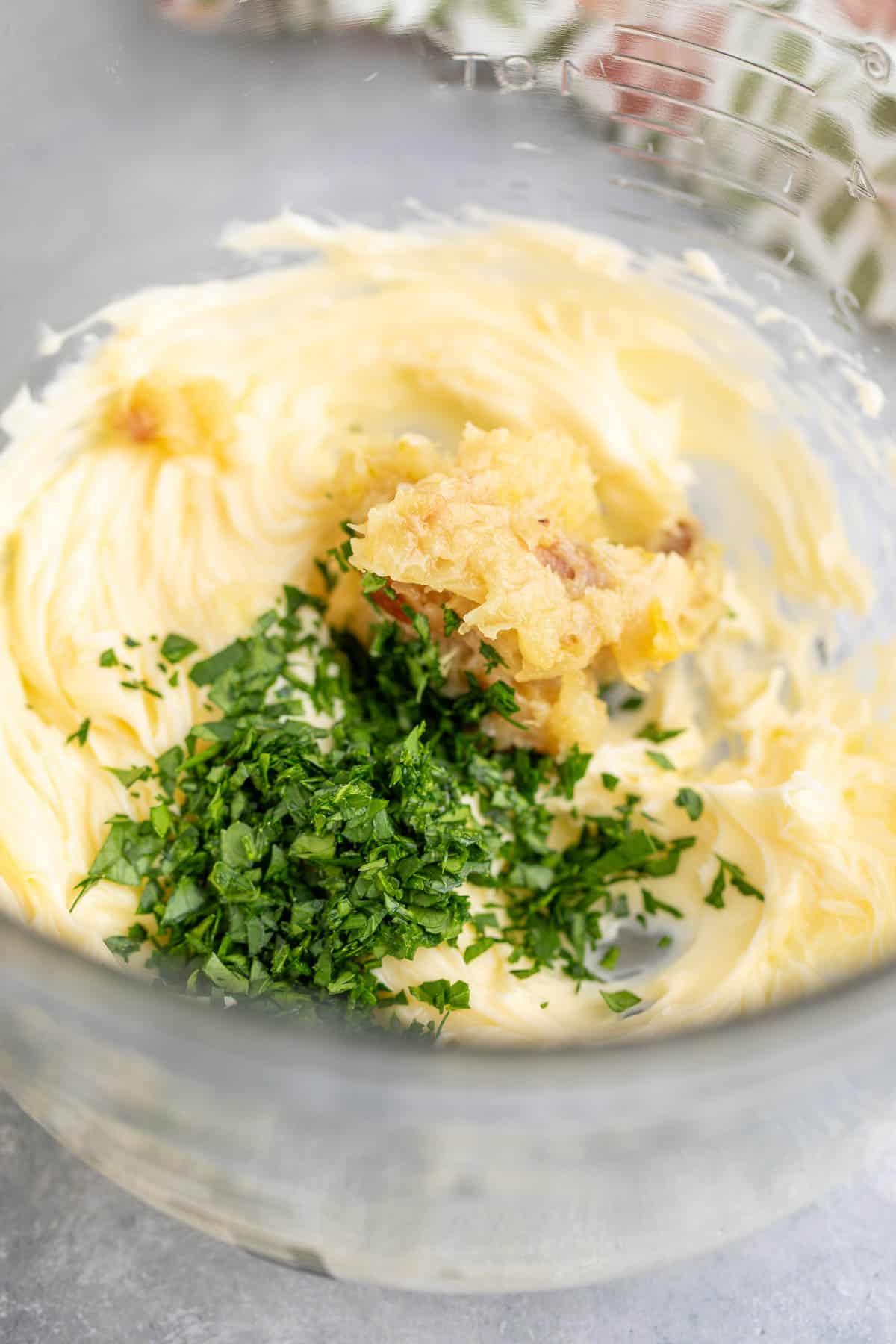 Softened butter with roasted garlic and parsley. 
