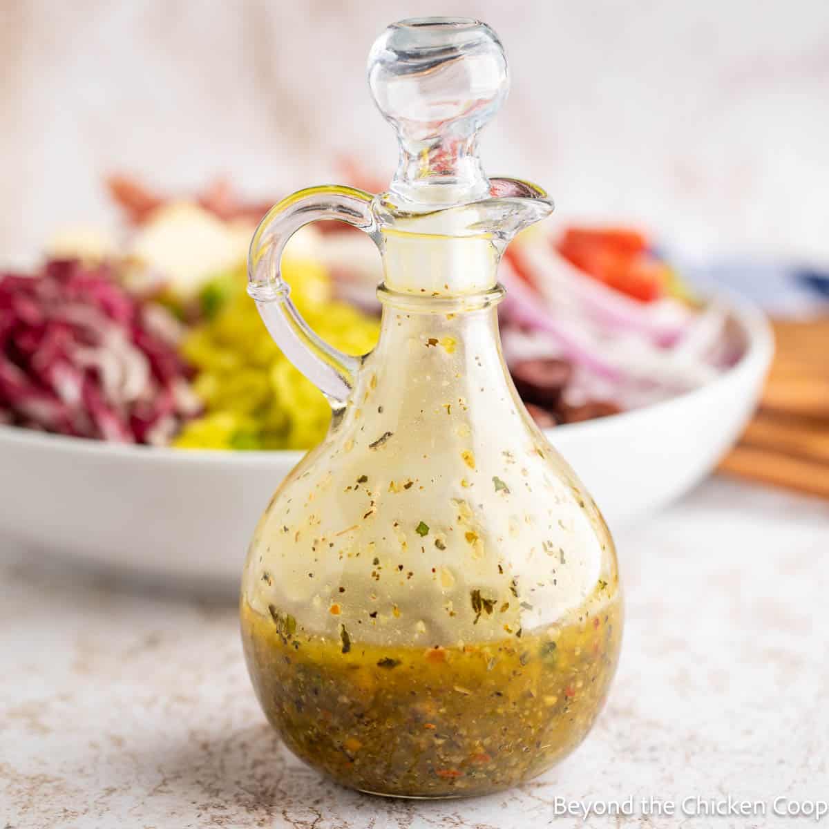 Zesty Italian Dressing in a small glass bottle.