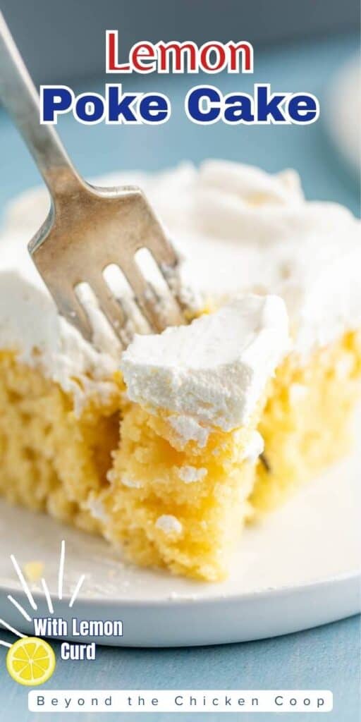 A fork slicing into a piece of cake.
