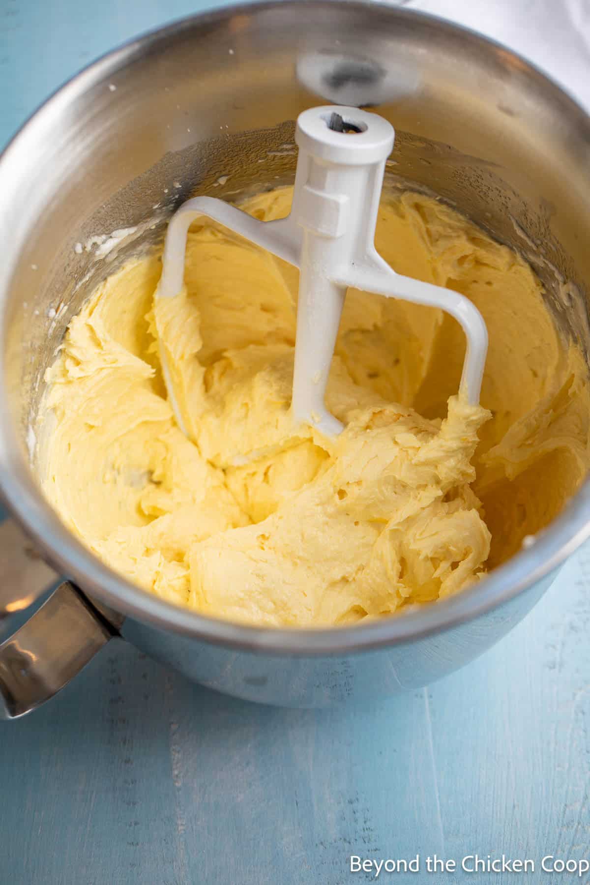 Cake batter in a mixing bowl. 