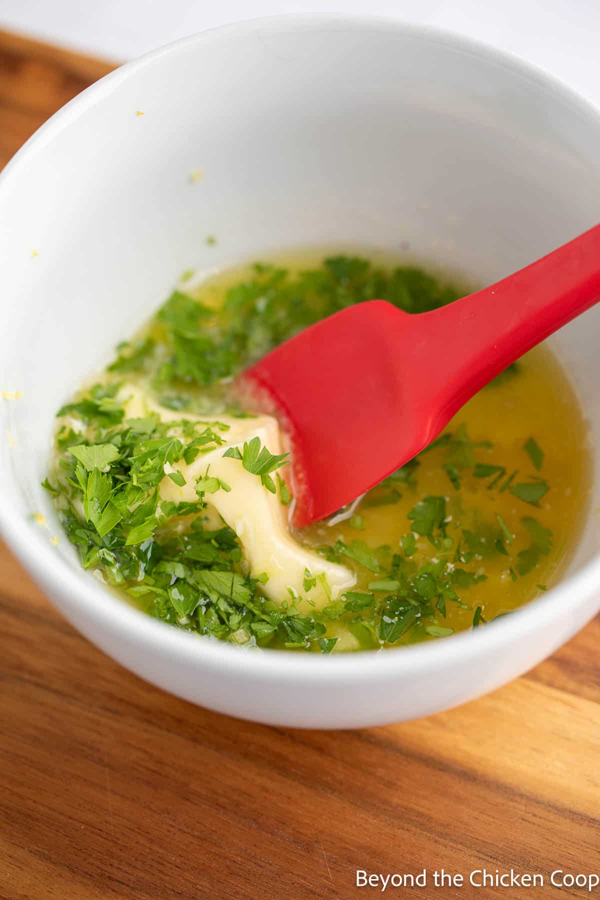 Butter mixed with parsley and lemon zest. 