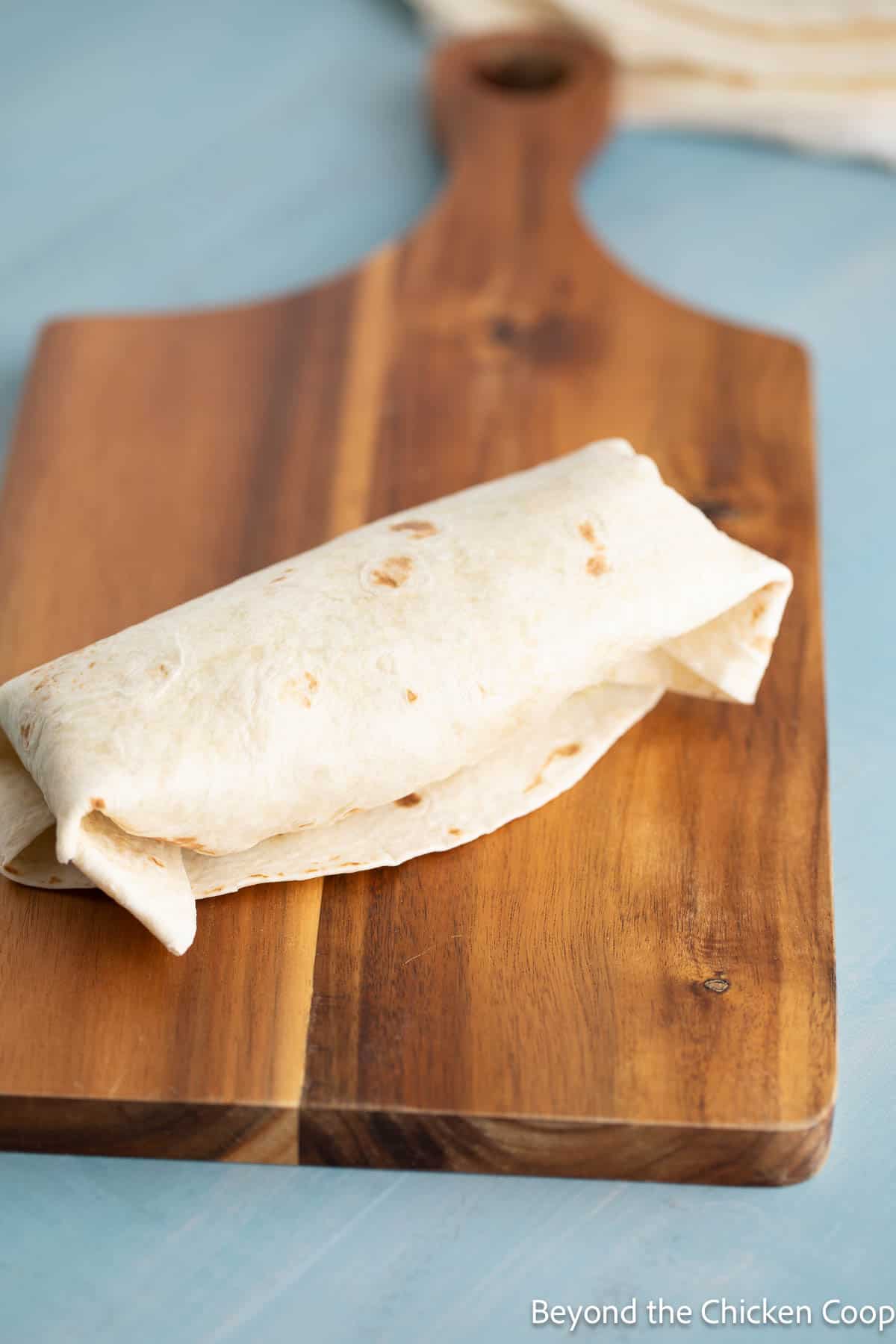 A wrapped Caesar salad tortilla. 