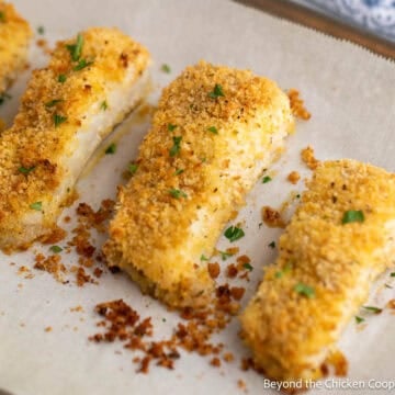 Parmesan Crusted Halibut on a baking sheet.