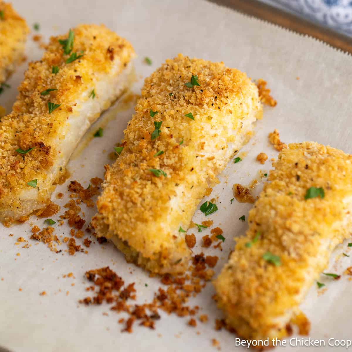 Parmesan Crusted Halibut on a baking sheet.