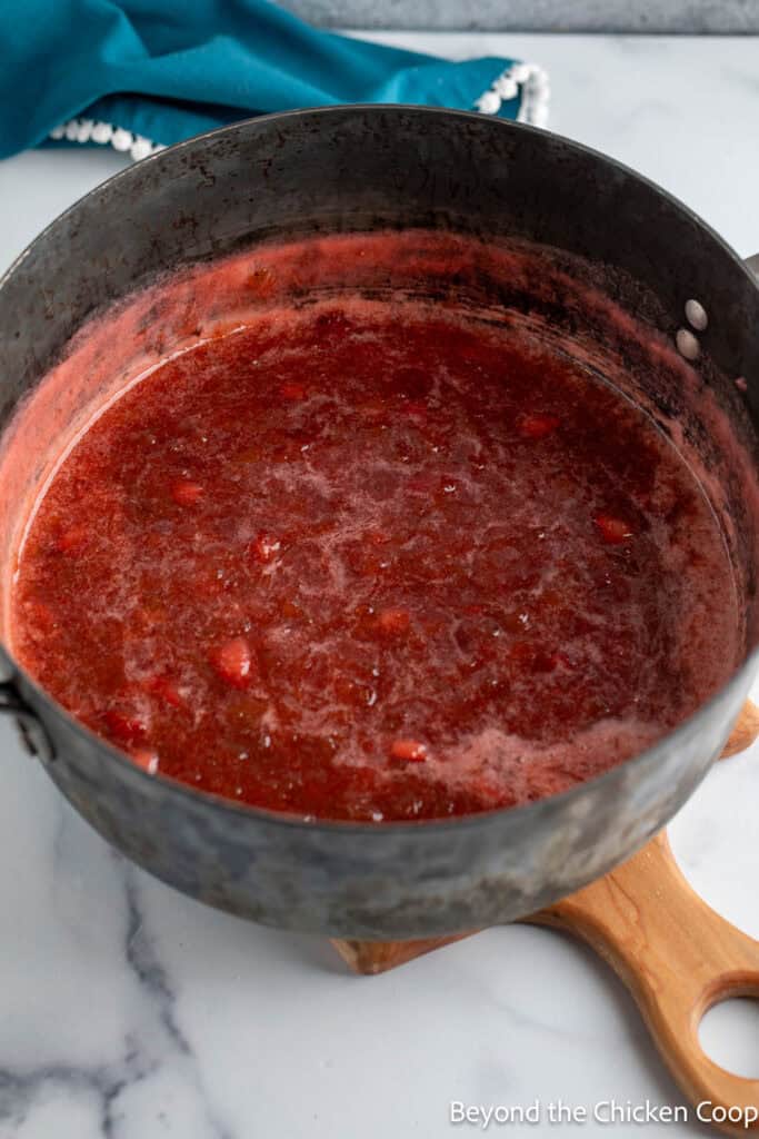 Cooked jam in a large pot. 