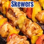 Teriyaki kabobs on a BBQ grill.
