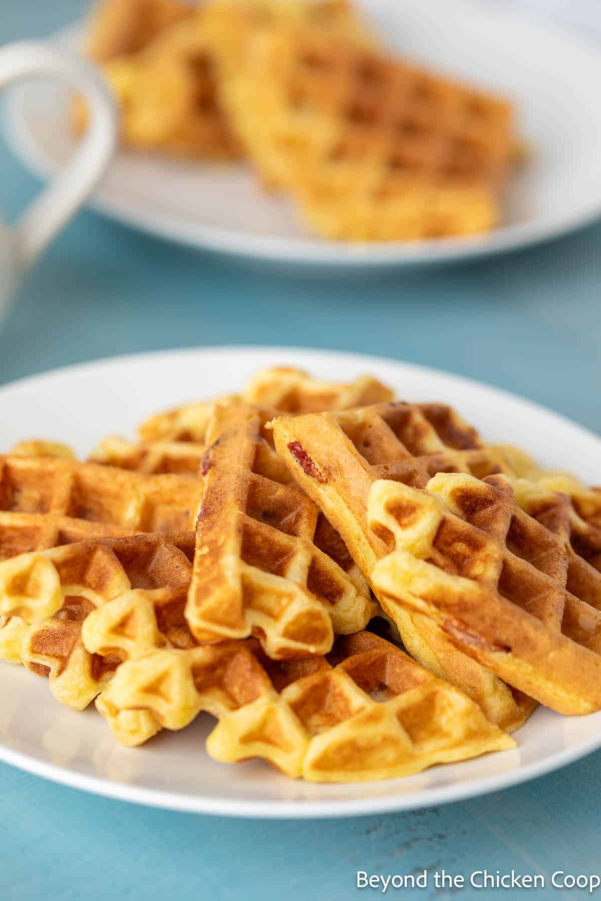 Waffles on a white plate.