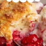 Raspberry cobbler with melting ice cream.