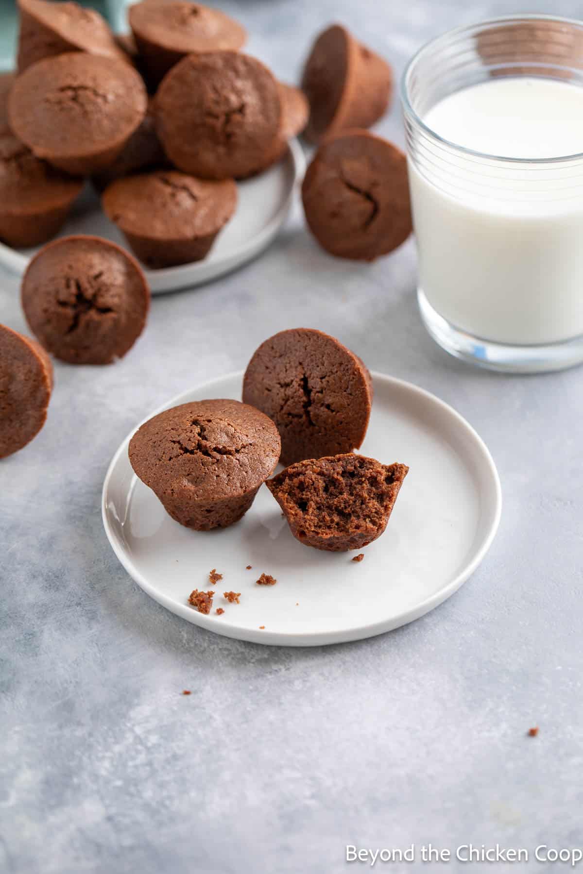 Mini brownies on a white plate. 