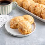 Carrots Cookies with an orange glaze on a small white plate