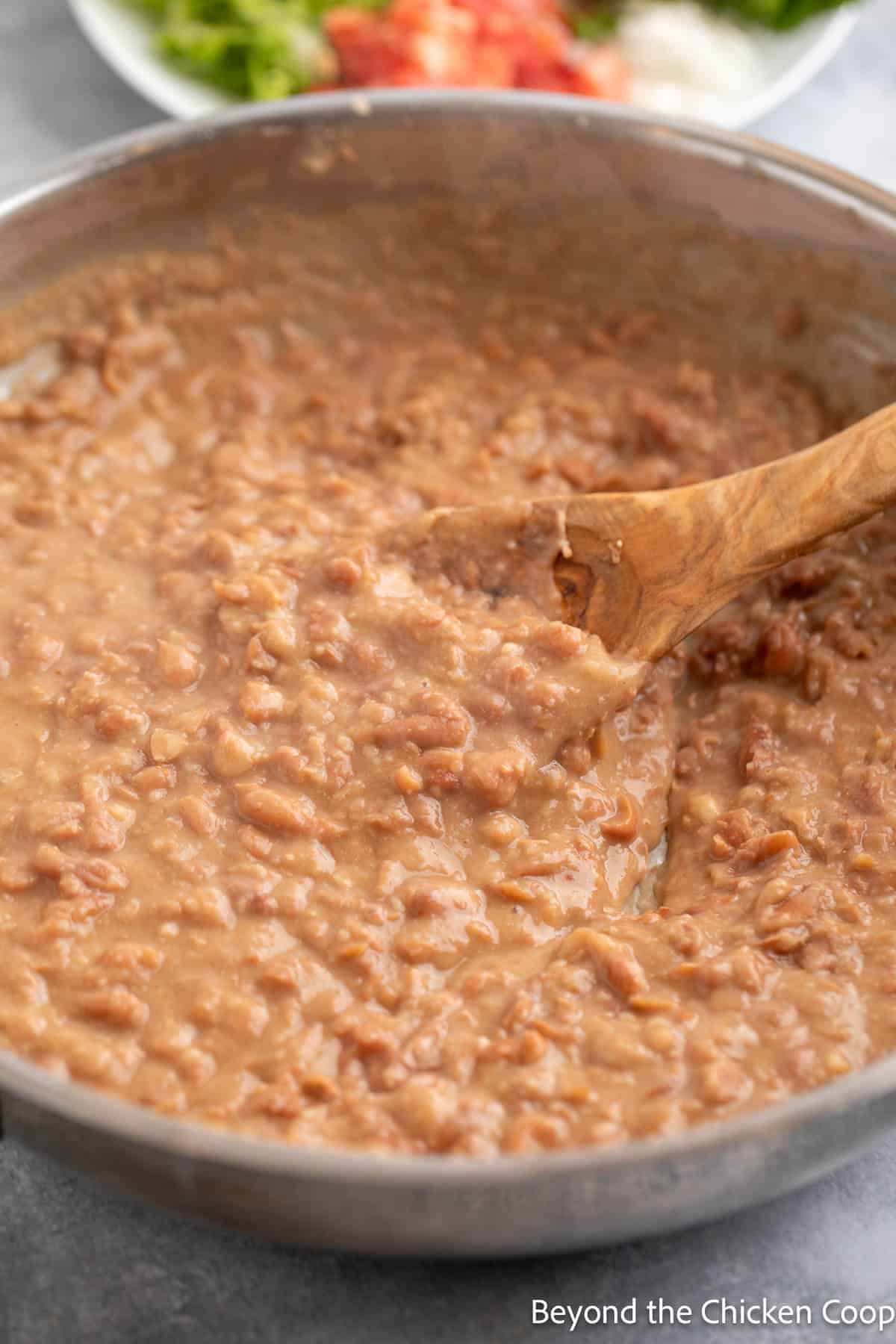 Refried beans in a pan. 