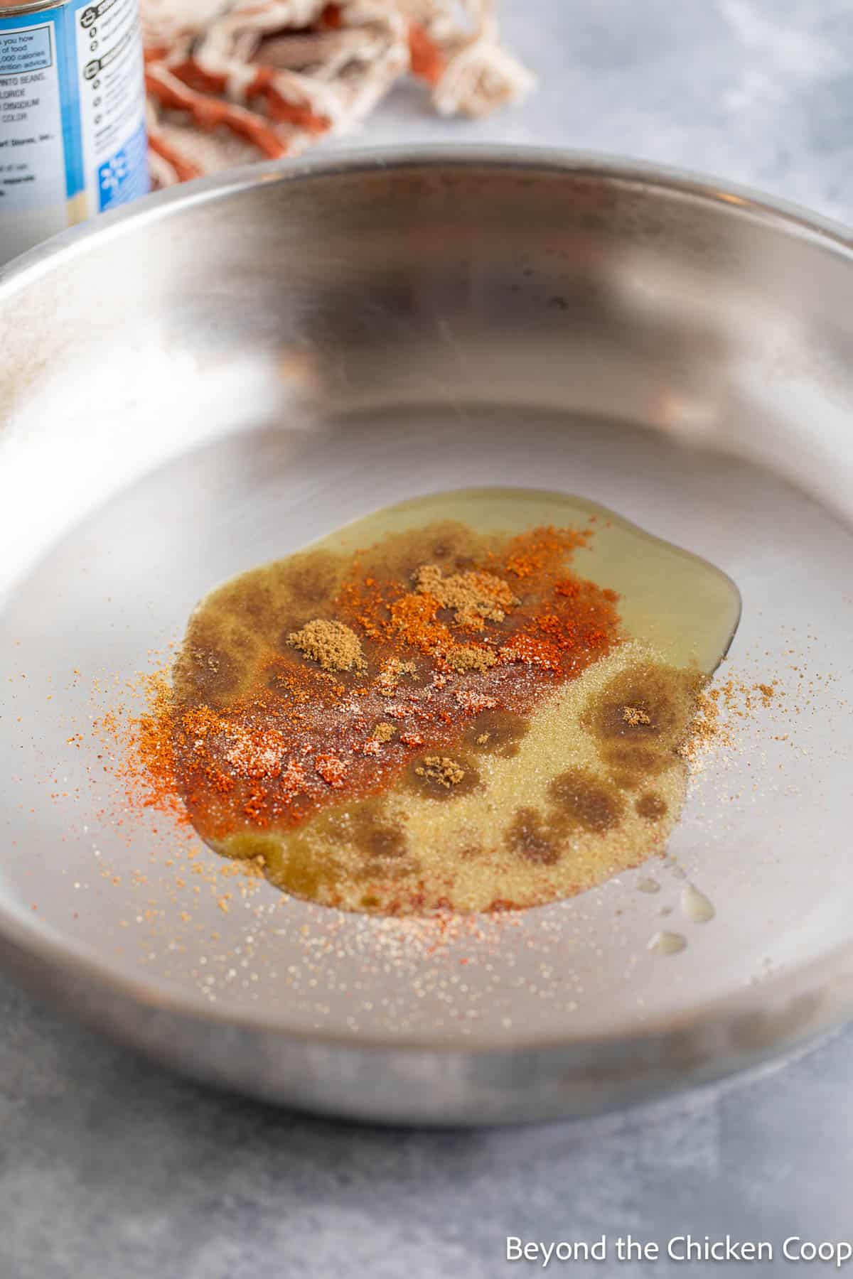 Spices in a pan with a bit of oil. 