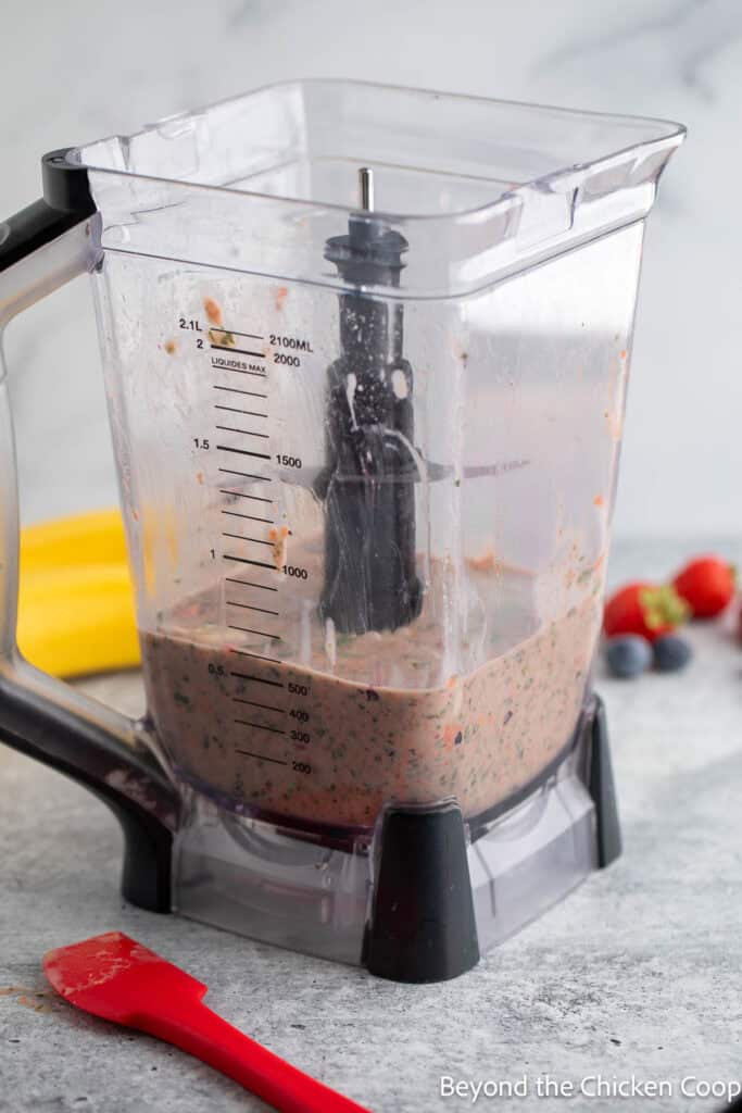 Mixing a smoothie in a blender.