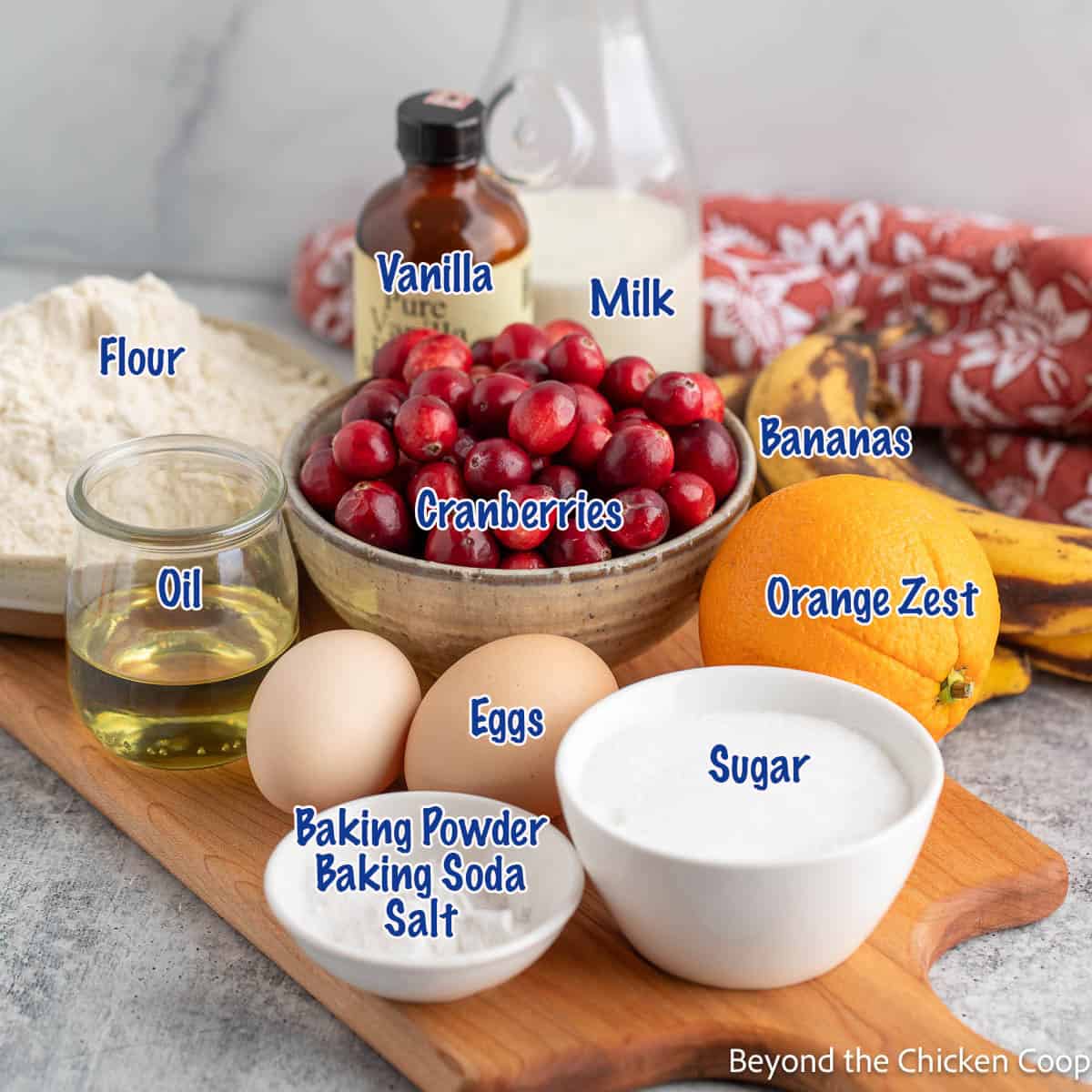 Ingredients in small bowls on a wooden board.