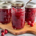 Homemade Canned Cranberry Sauce in glass canning jars.