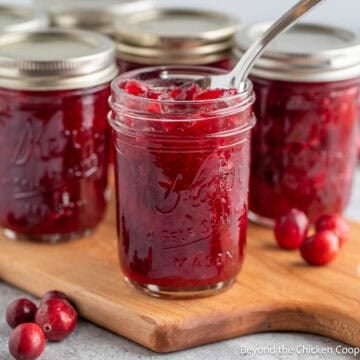 Homemade Canned Cranberry Sauce in glass canning jars.
