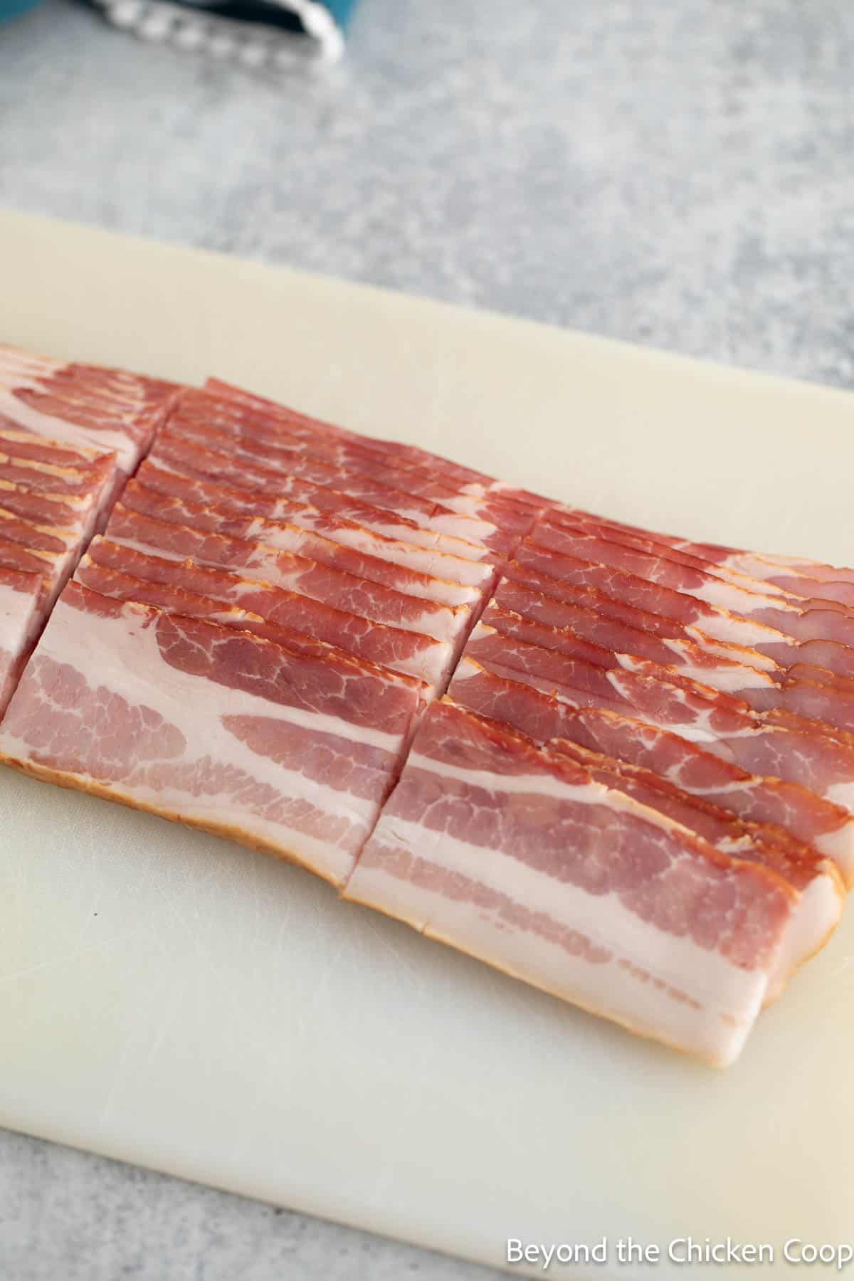 Bacon sliced into thirds. 