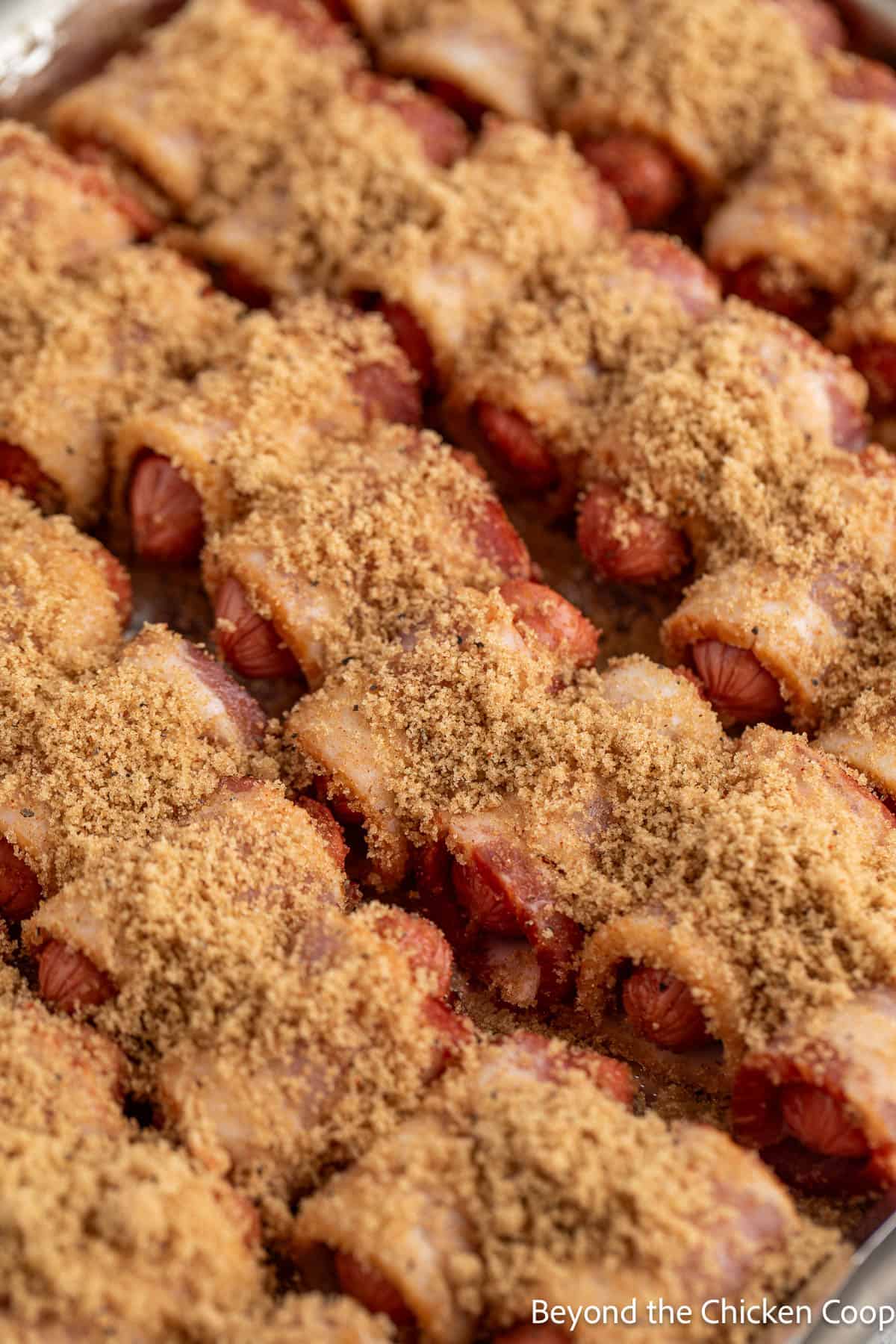 Smokies topped with bacon and brown sugar. 