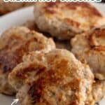Sausage patties on a white plate.