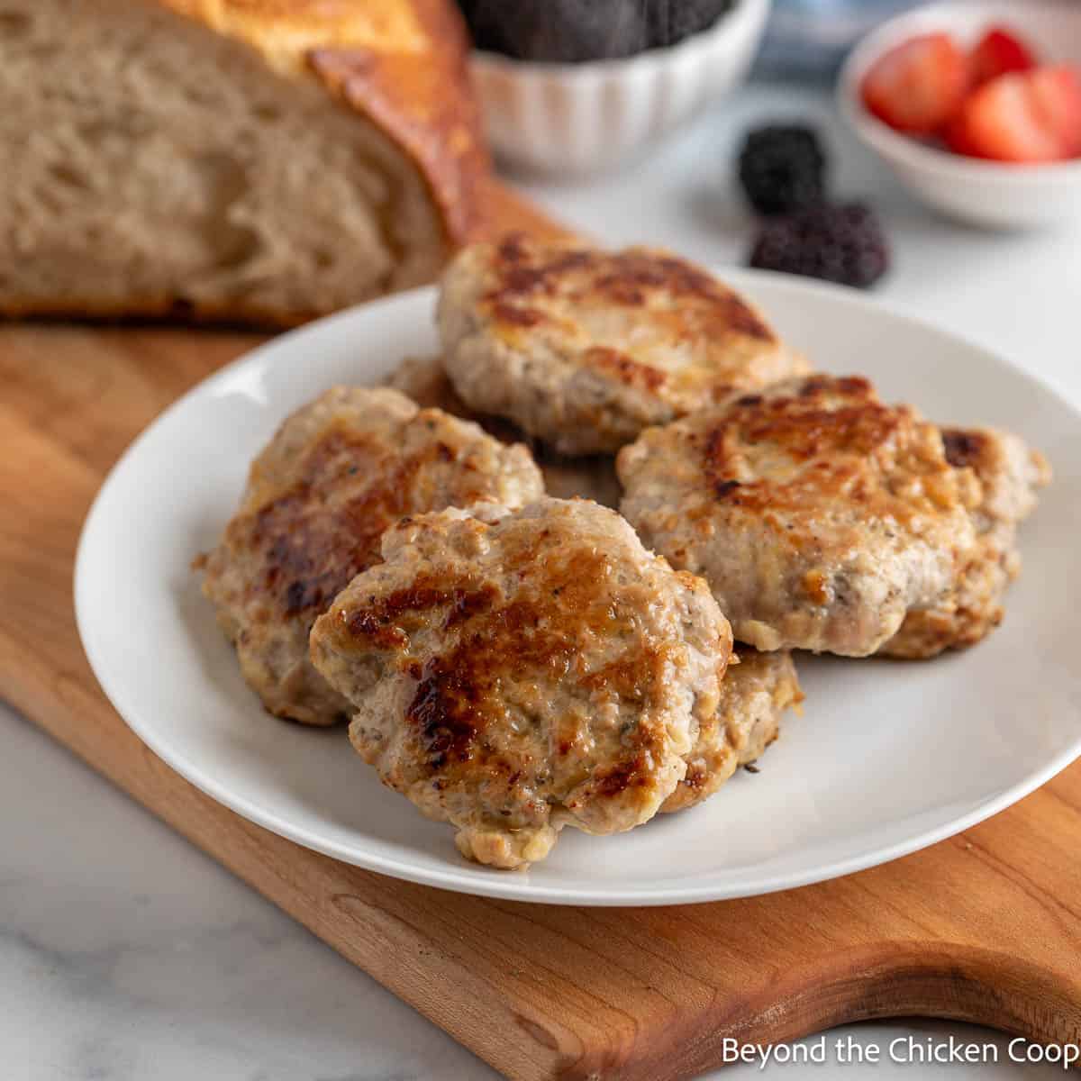 Apple Breakfast Sausage on a white plate.