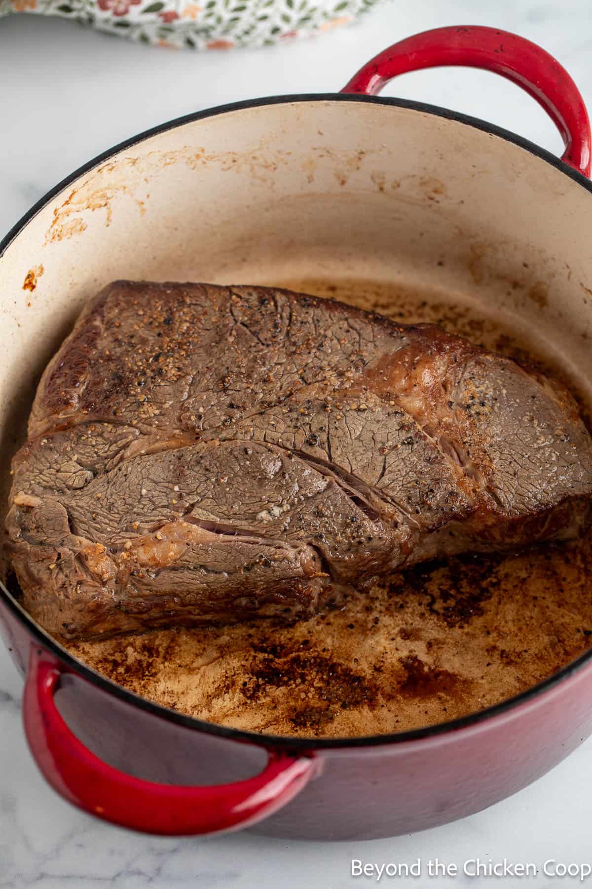 Browning a chuck roast in a dutch oven. 