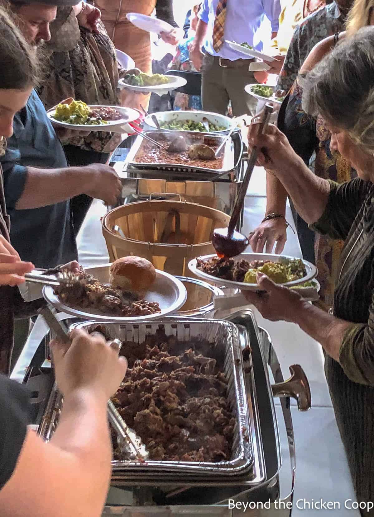 A wedding buffet filled with food. 