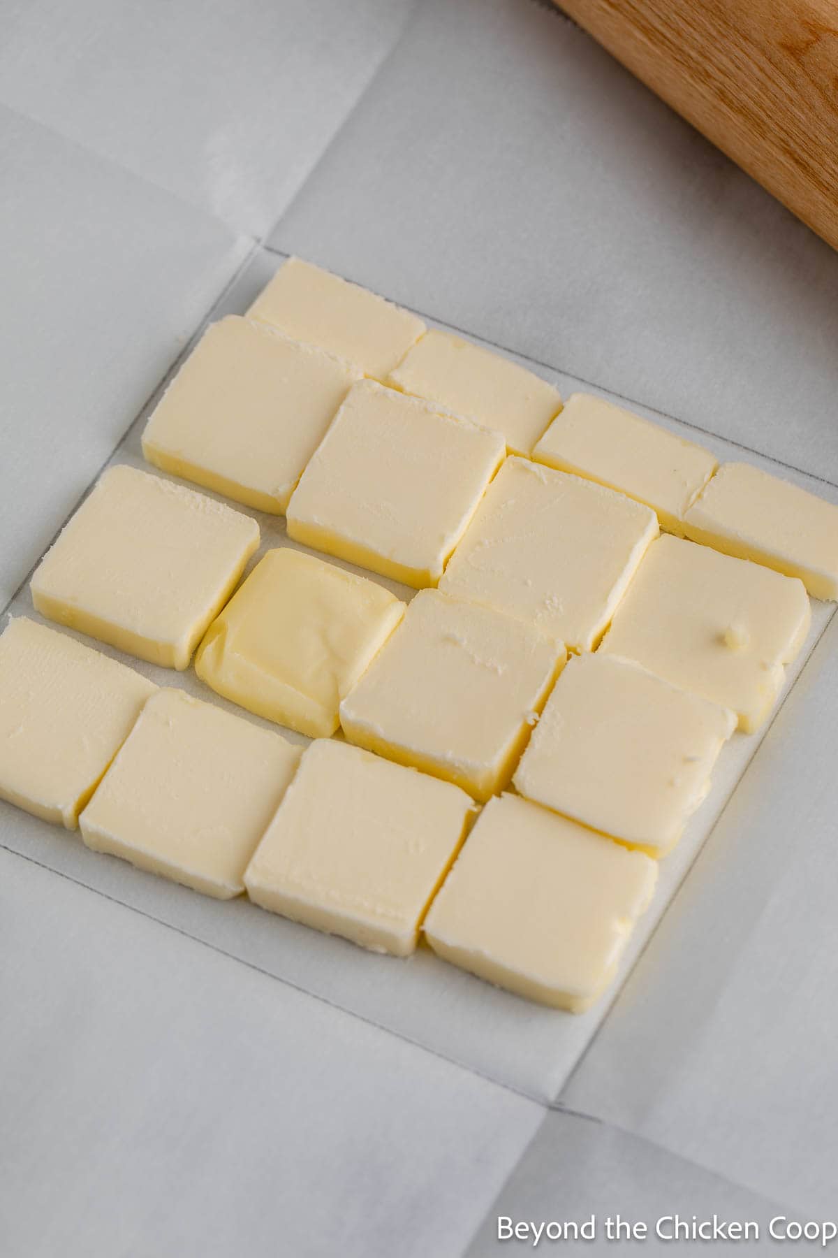 Creating a butter packet for puff pastry dough. 
