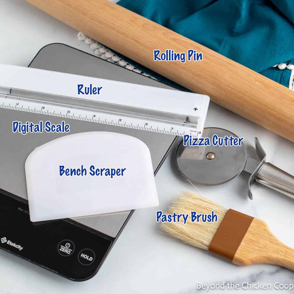 Kitchen utensils arranged on a counter. 