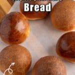 Round dinner rolls displayed in a circle.