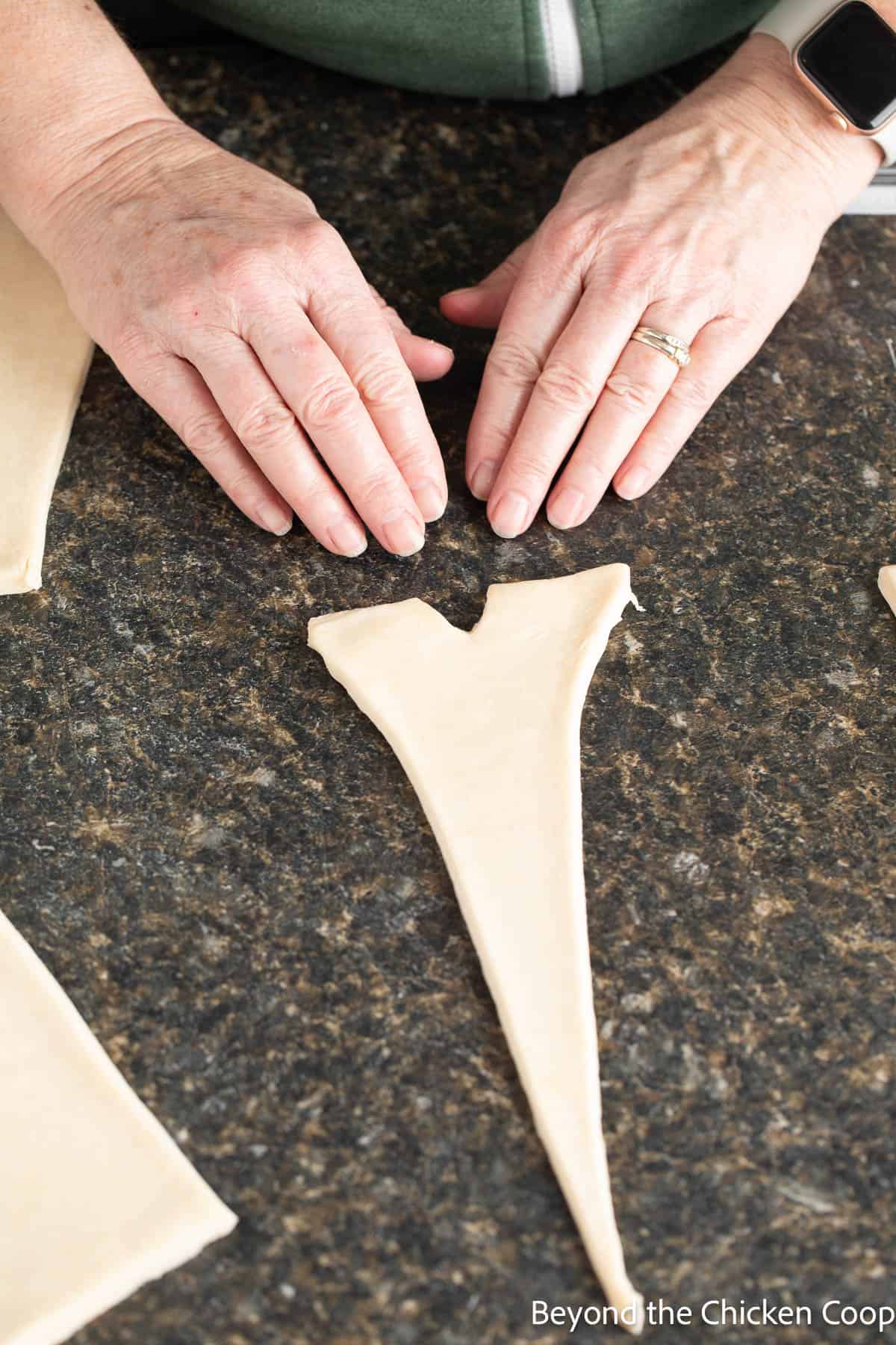 Getting ready to roll up a croissant. 