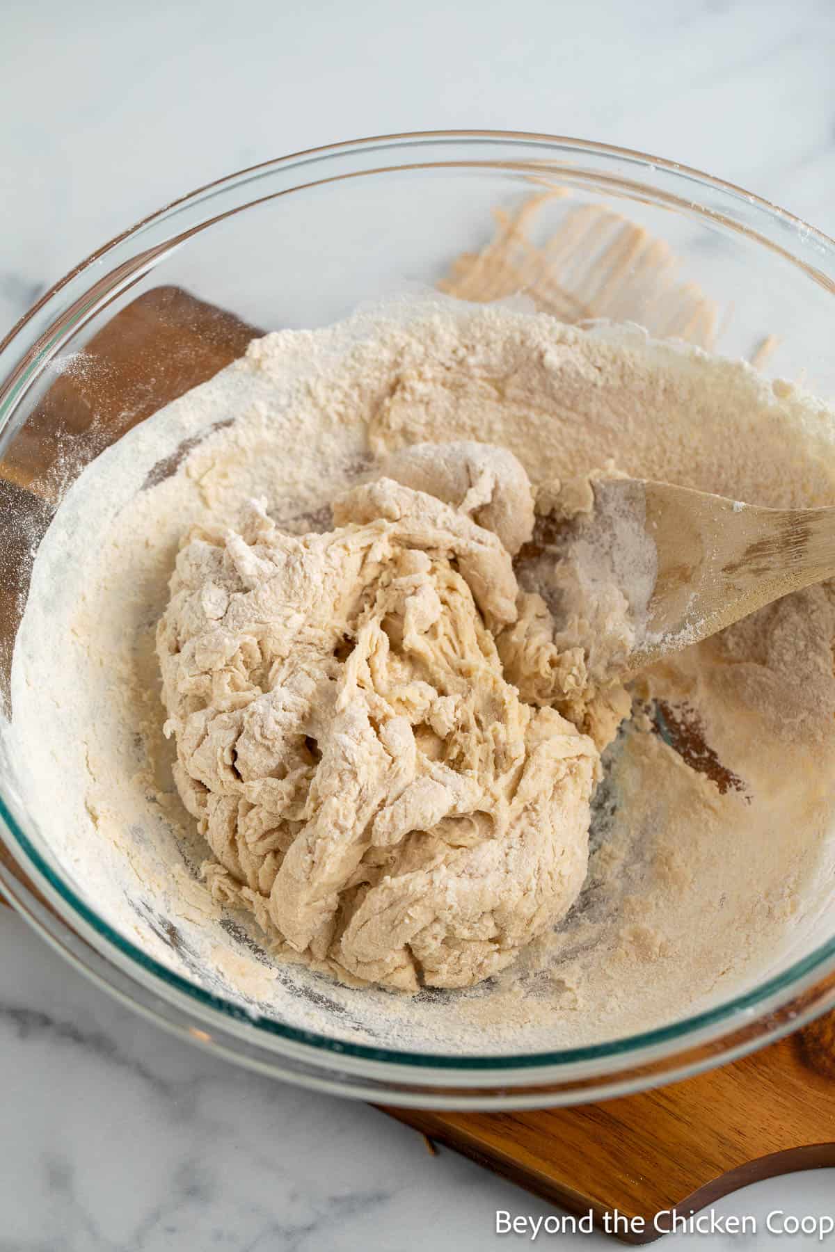 Bread dough in a glass bowl. 