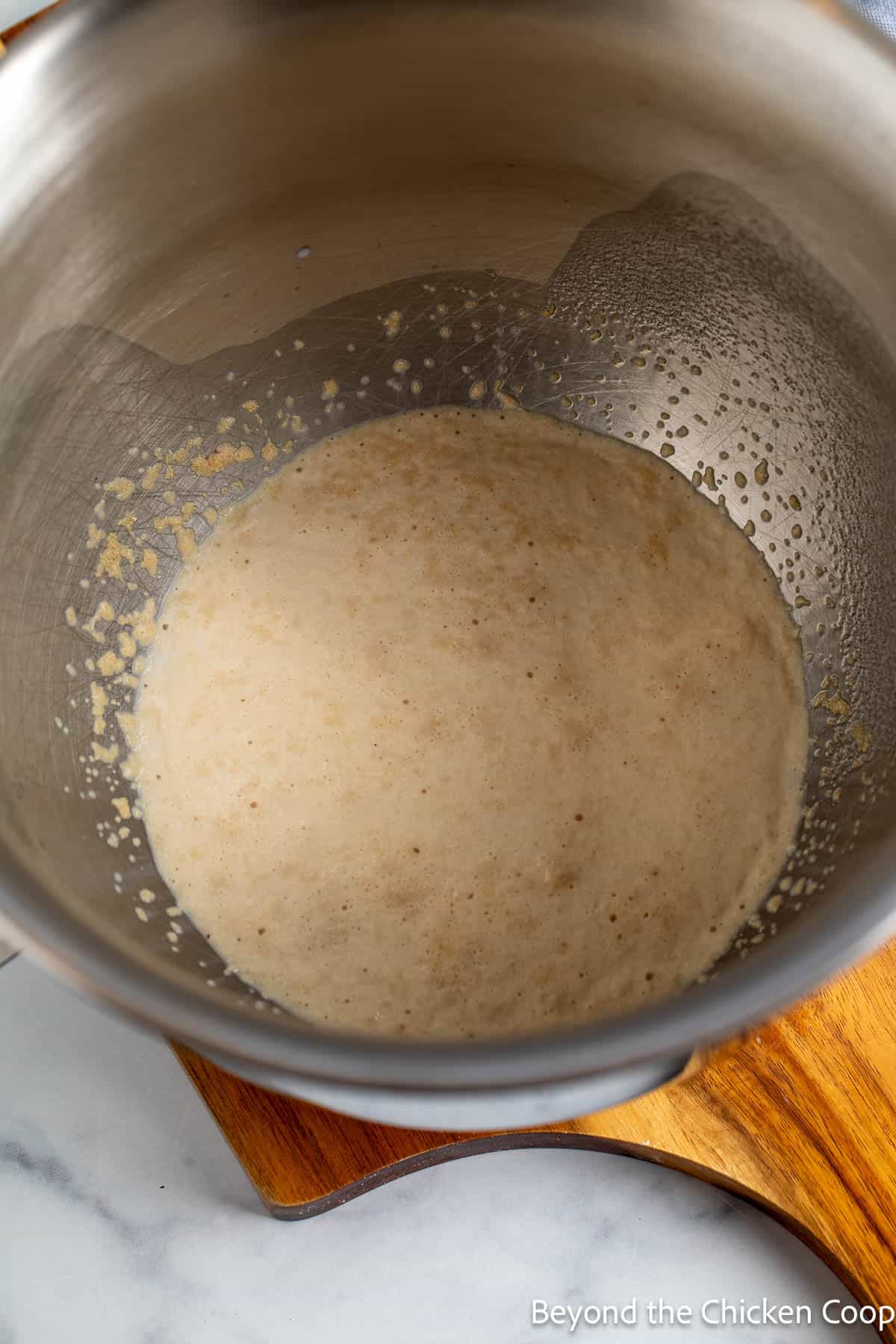 Proofed yeast in a mixing bowl. 