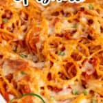 Pasta casserole topped with freshly chopped basil.