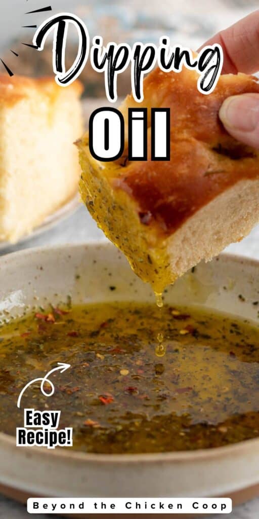 Oil with herbs dripping from a slice of bread.