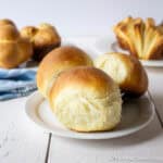 Homemade Dinner Rolls on a small white plate.