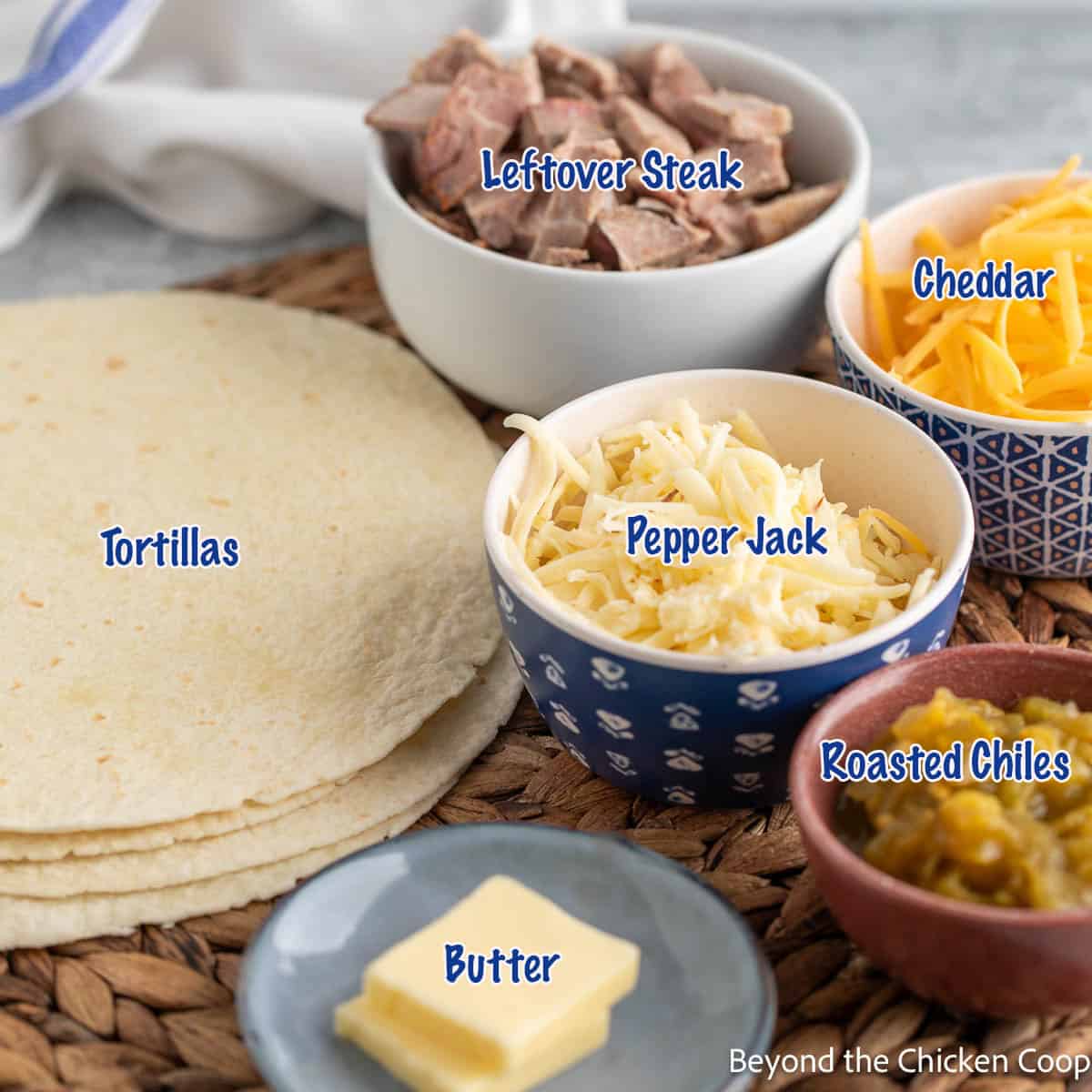 Ingredients for making a steak quesadilla.
