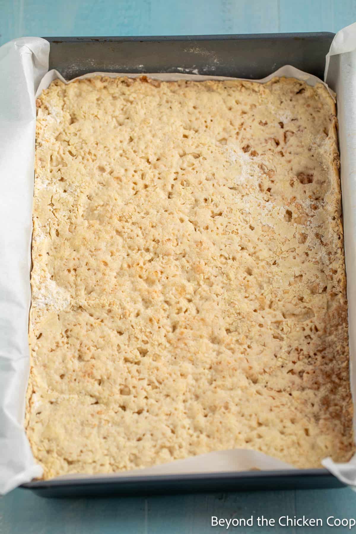 Baked shortbread crust in a pan. 