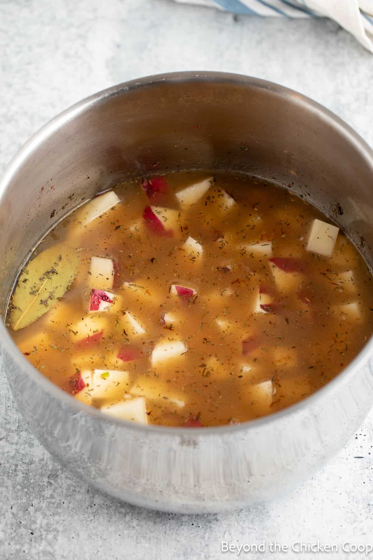 Diced potatoes in a pot.