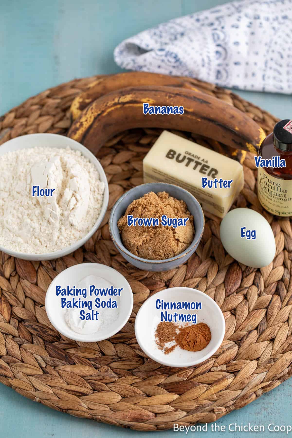 Ingredients in small bowls for making banana muffins. 