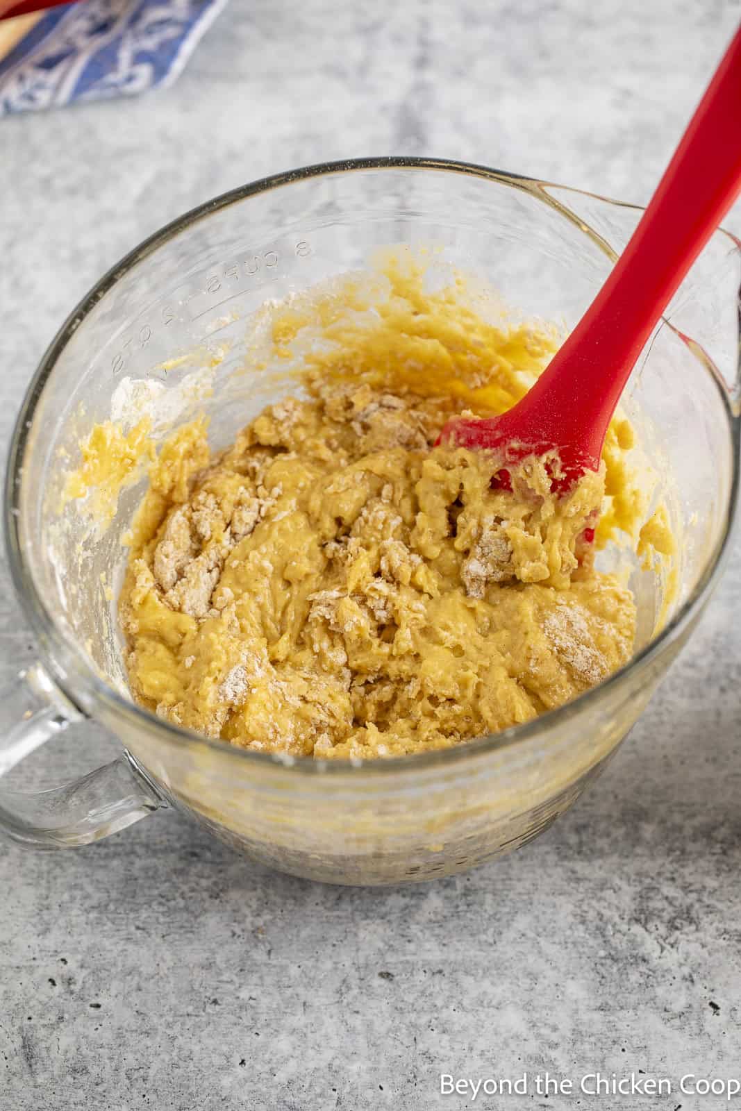 Cake batter in a glass bowl. 