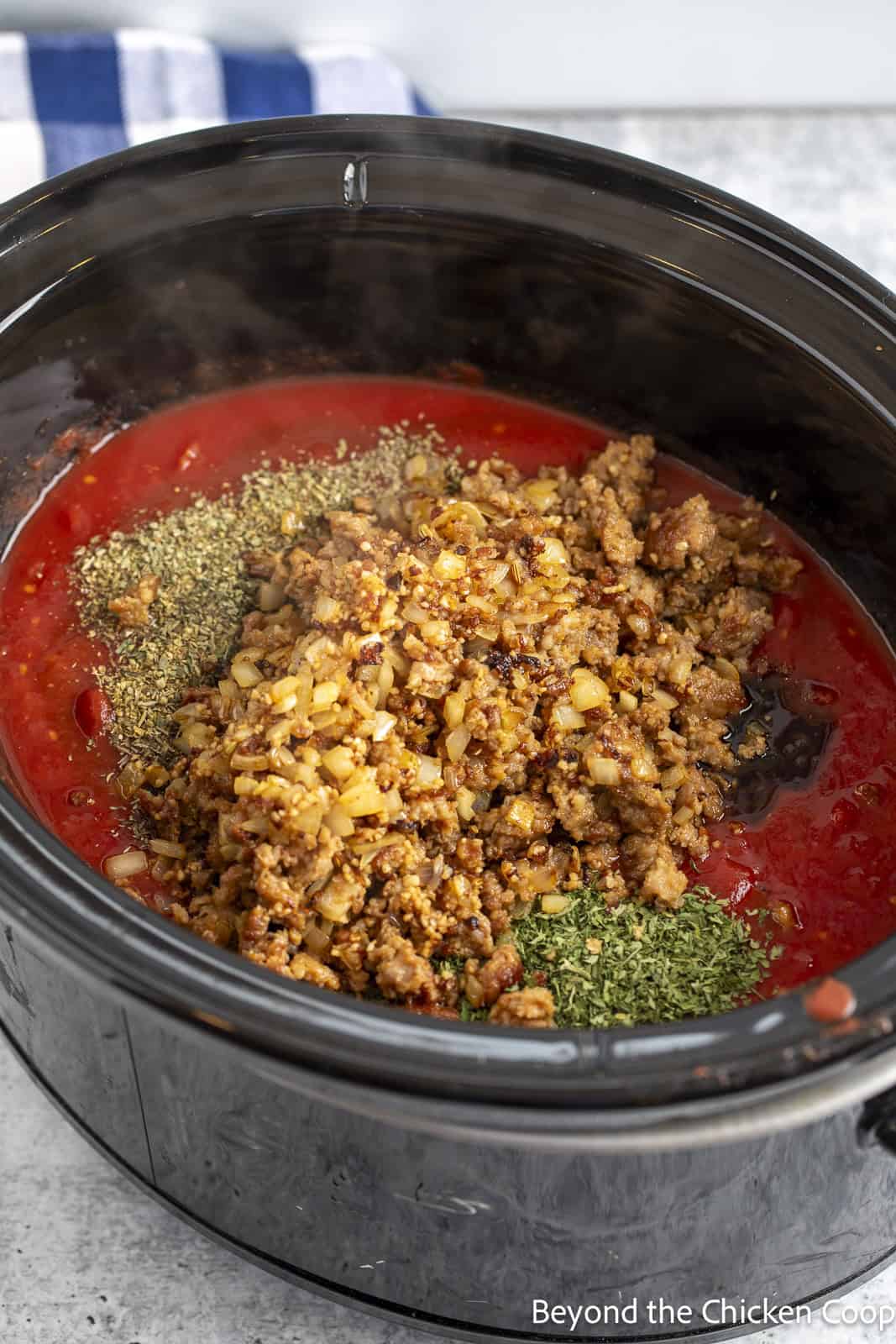 Making spaghetti sauce in a crock pot. 