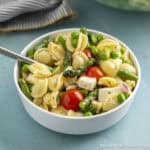 A bowl filled with Orecchiette Pasta Salad.