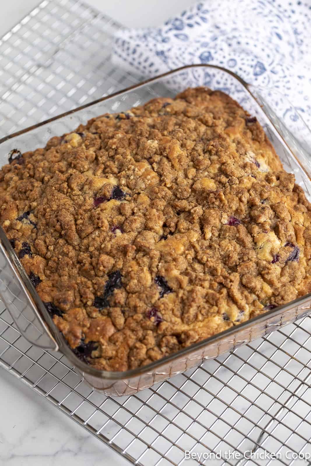 A baked coffee cake with crumb topping. 