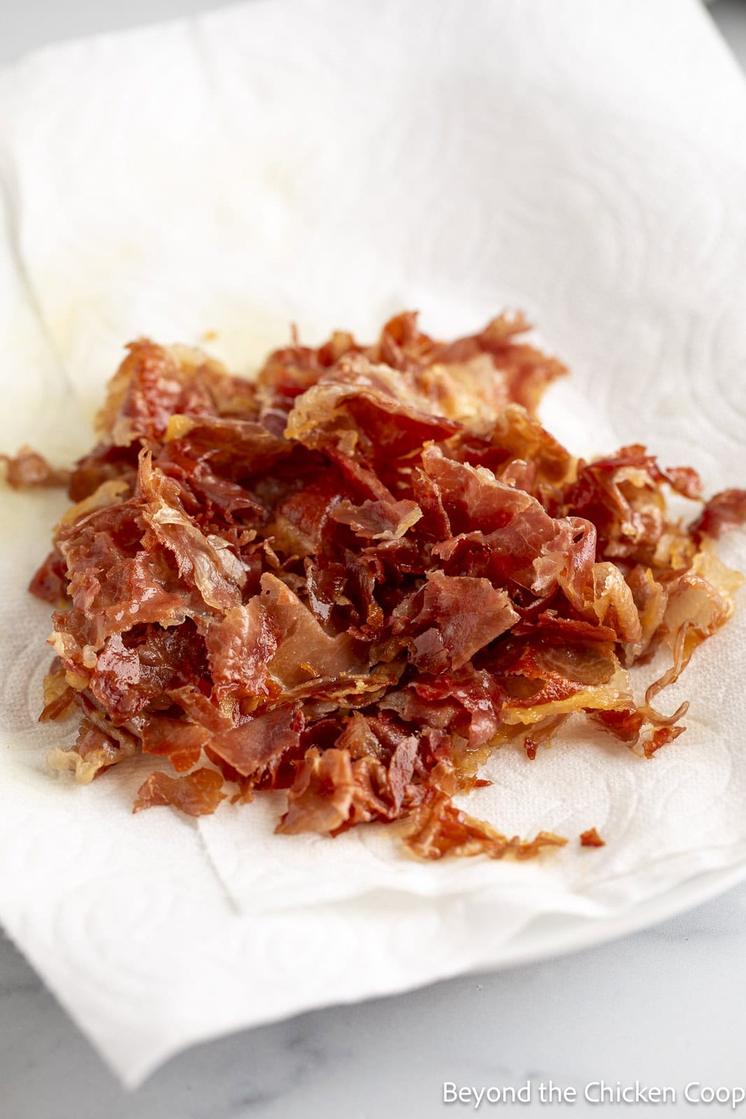 Crispy prosciutto on a paper towel. 