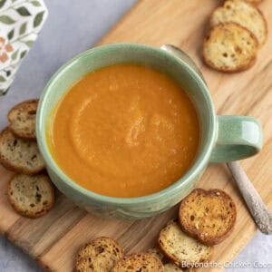 Carrot Ginger Soup in a green mug.
