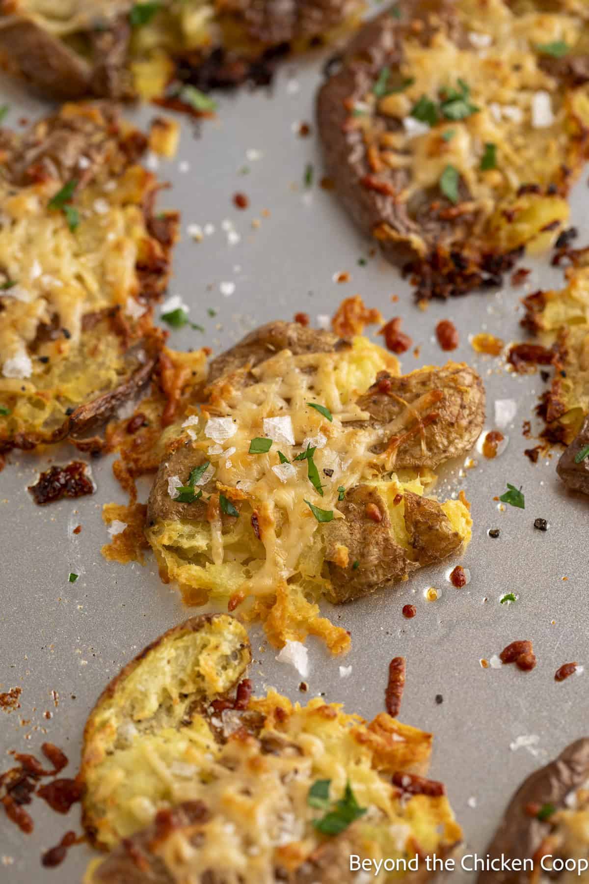 Crispy baby potatoes topped with Parmesan cheese.