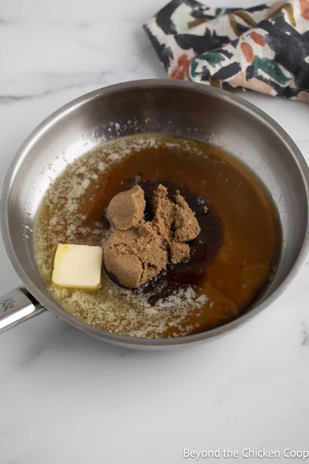 Butter, brown sugar, and cinnamon in a saute pan. 